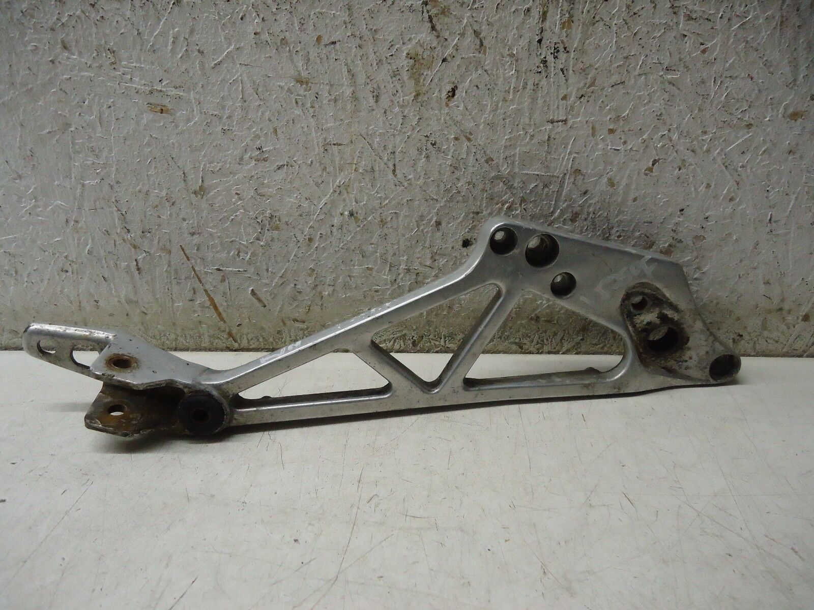 HONDA VF750F R-H FOOTREST HANGER 