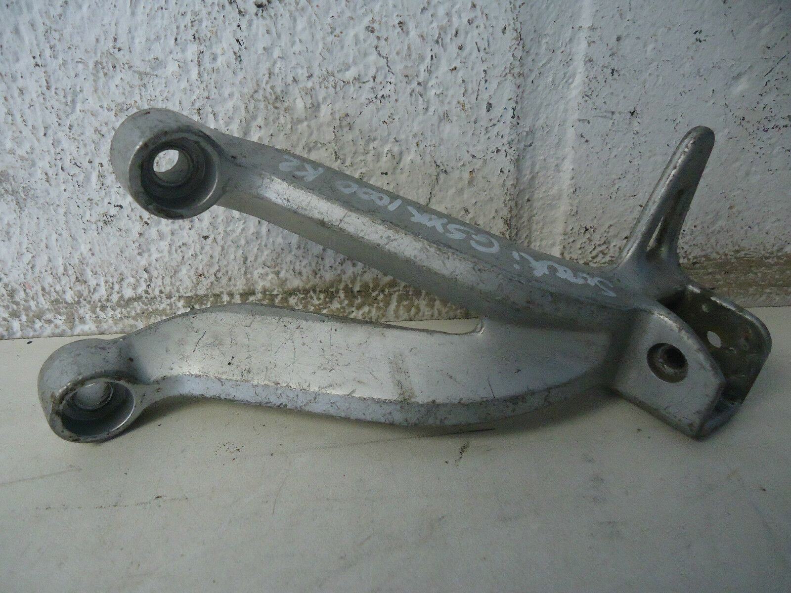 SUZUKI GSXR 1000 LH REAR FOOTREST HANGER 