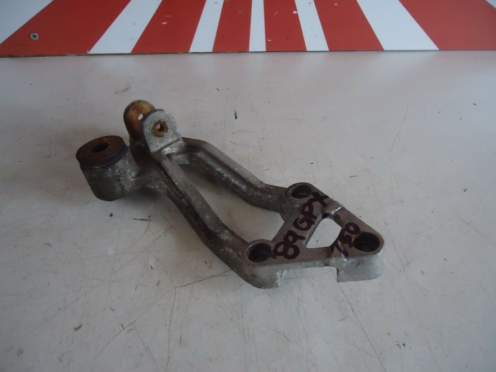 KAWASAKI GPX750R LH REAR FOOTREST HANGER 